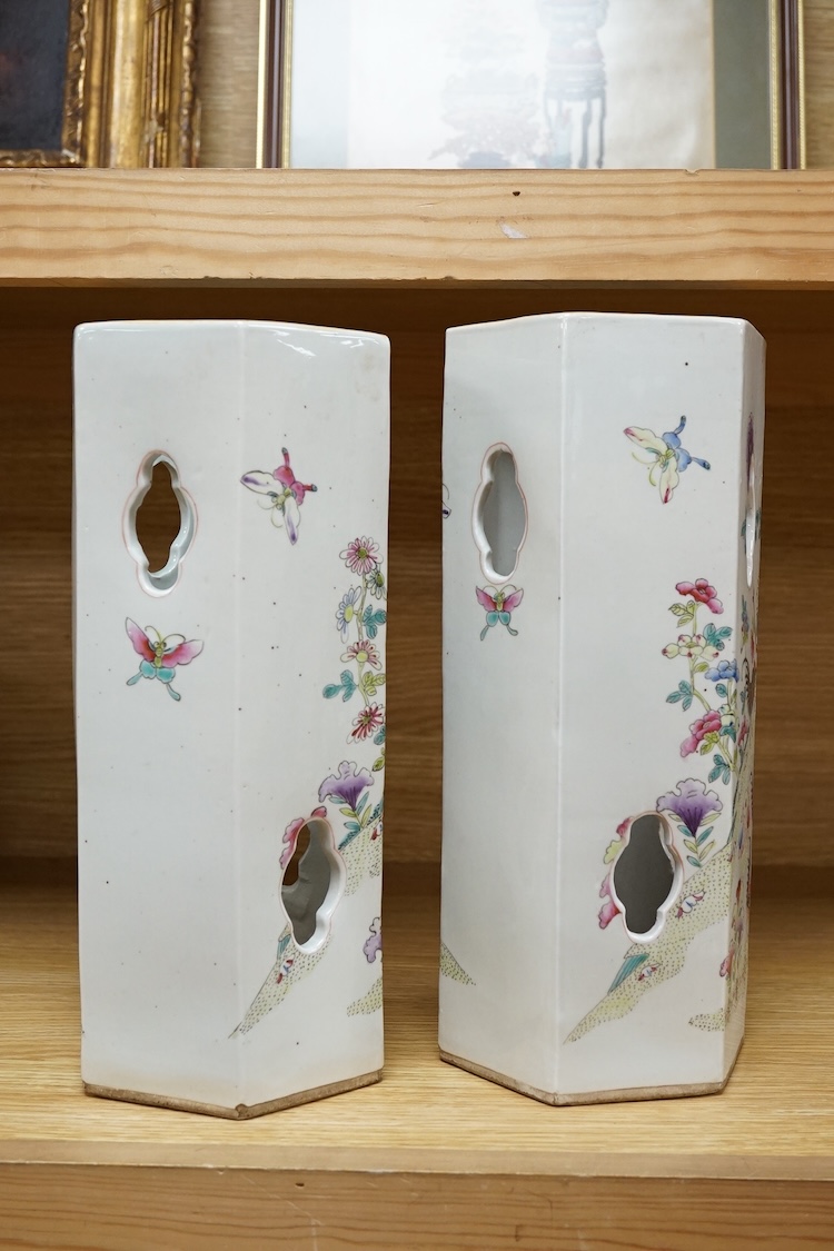 A pair of hexagonal Chinese famille rose porcelain hat stands, 30cm high